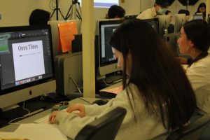 Accolade editor-in-chief senior Kate Yang checks the information sheet for the newspaper layout category while working on Adobe InDesign during the Orange County Journalism Education Association contest Saturday, March 4, at Fullerton College. The senior’s entry earned her a first-place trophy.