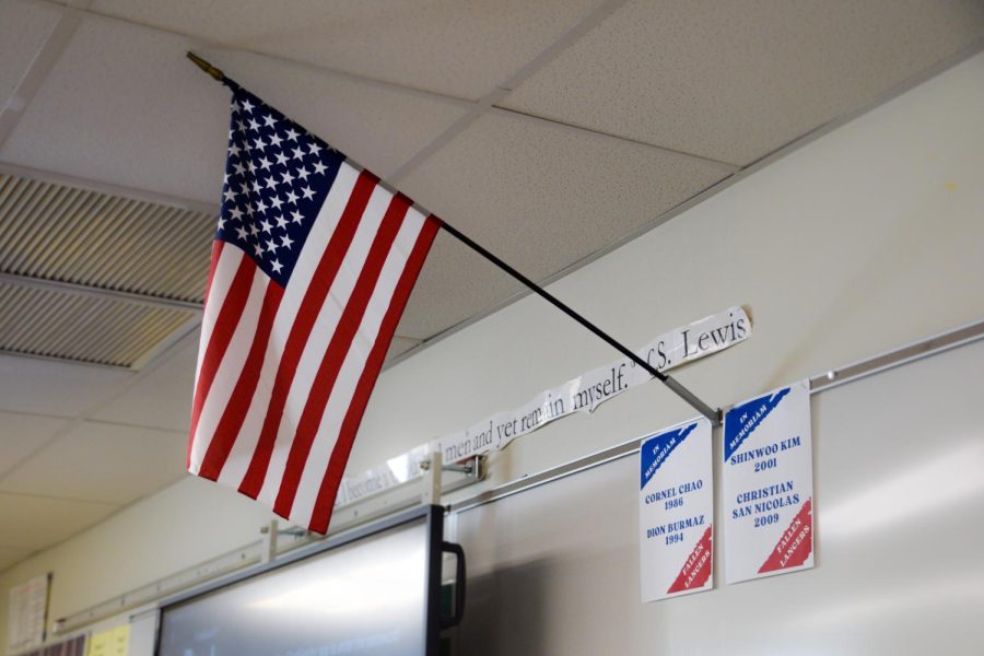 The names of
fallen alumni in the U.S. military are displayed on the white board where the American flag is in English teacher Scott Rosenkranzs class in Room 185. Rosenkranz started memorializing
these former SH students this school year.