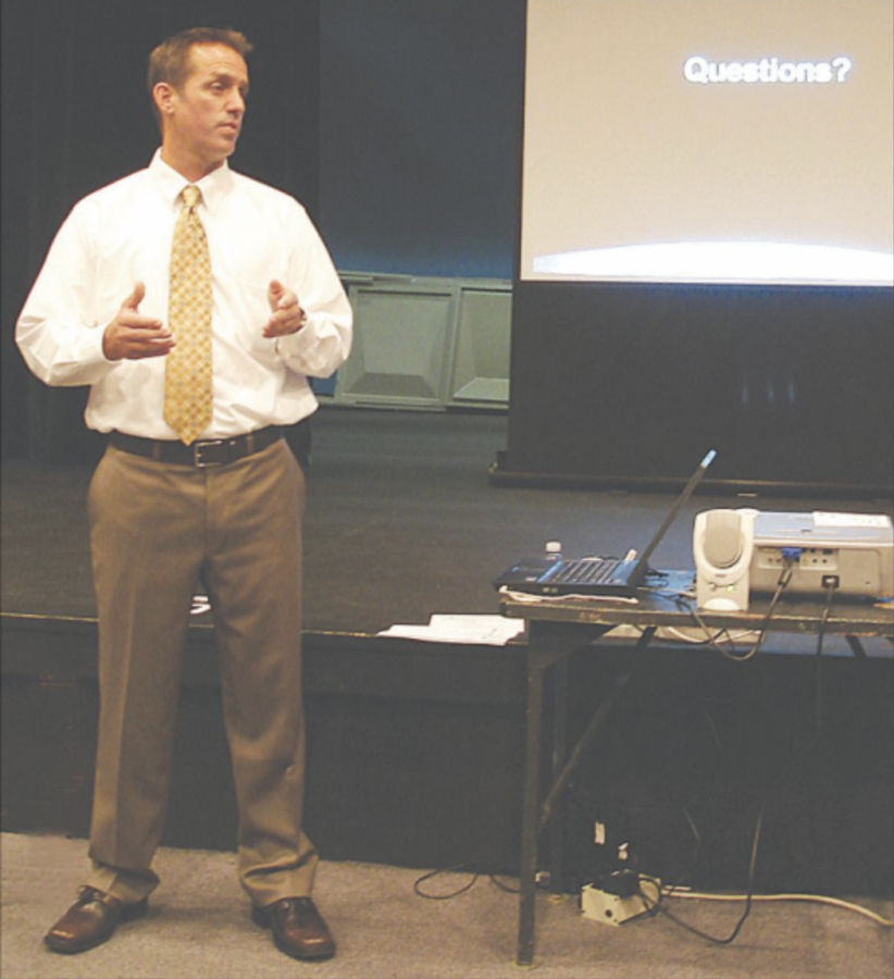 International Baccalaureate coordinator and Conservatory of Fine Arts director Brian Wall speaks at the 2007 Open House.