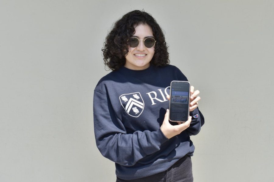 Senior Lynette Ochoa poses with her phone which features the email that she received from Rice University, celebrating her acceptance to the school. 