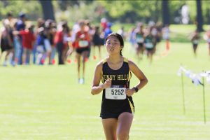 Senior cross country runner Esther Kim heads toward the finish line during the first Freeway League Cluster of the season at Ralph B. Clark Park in Buena Park on Wednesday, Sept. 6. The Lady Lancers placed third at the meet. 
