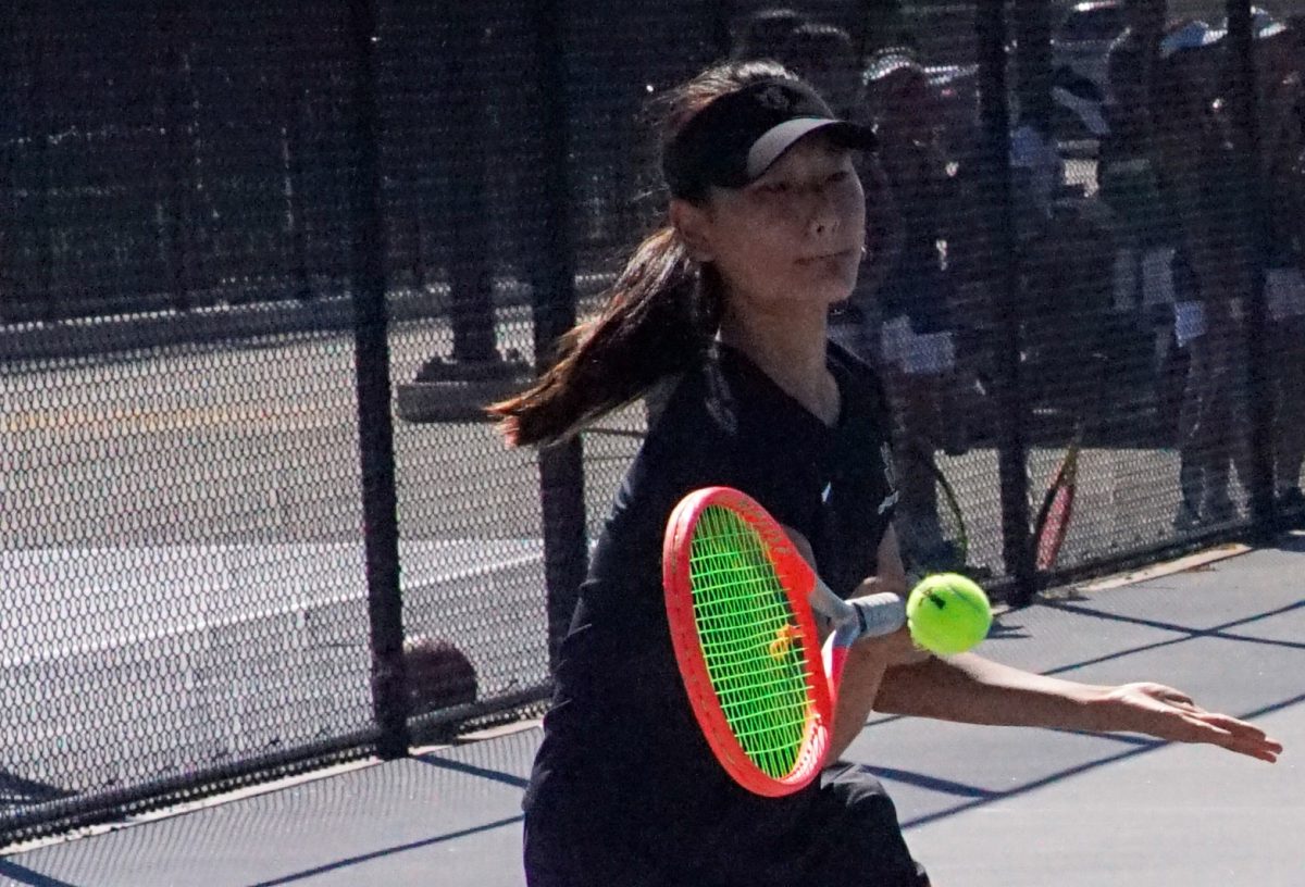 Freshman+Kate+Yoon%2C+one+of+the+top+newcomers+joining+the+Lady+Lancers+this+season%2C+gets+ready+to+return+a+forehand+against+her+opponent+from+Bolsa+Grande+High+School+on+the+Sunny+Hills+tennis+court+Thursday%2C+Sept.+7.