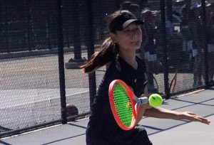 Freshman Kate Yoon, one of the top newcomers joining the Lady Lancers this season, gets ready to return a forehand against her opponent from Bolsa Grande High School on the Sunny Hills tennis court Thursday, Sept. 7.