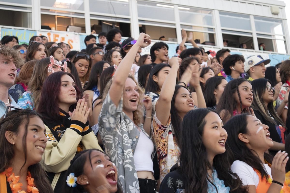 Sunny Hills student section decks out in beach attire for a Surf’s Up theme and lets out a cheer at the Friday, Aug. 25, football game.