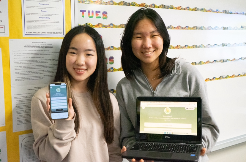 Teens2Tots co-presidents sophomores Danielle Kim (left) and Francess Pak show the official Teens2Tots website on their devices in Room 92 on Tuesday, Jan. 16.