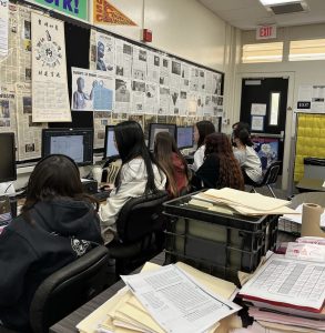Section editors of the 2022-2023 school year work on newspaper layouts in  The Accolade  room after school. This was a recurring daily routine during the week that print issues were released.