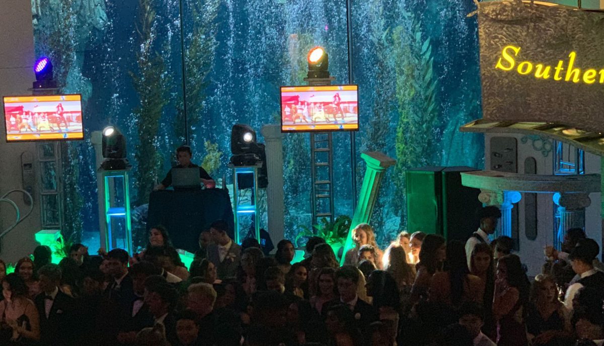 Sunny Hills students enjoy the 2019 prom at the Aquarium of the Pacific in Long Beach, with the DJ and dance floor set up in the main area. The dance will return to this location Saturday, April 6.