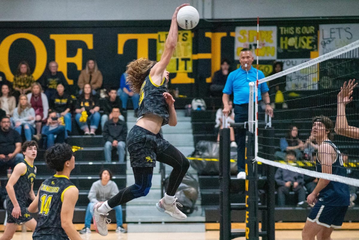 Outside+hitter+junior+Matthew+Barta+strikes+the+ball+as+he+jumps+to+make+a+kill+during+the+first+round+of+CIF+in+a+home+game+on+Thursday%2C+April+25+against+the+Vista+Murrieta+Broncos.%0A
