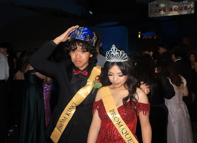 Seniors+Nathan+Leopoldo+%28left%29+and+Seannea+Arceo+walk+across+the+dance+floor+after+winning+prom+king+and+queen%2C+respectively%2C+at+the+Aquarium+of+the+Pacific+in+Long+Beach+on+Saturday%2C+April+6.
