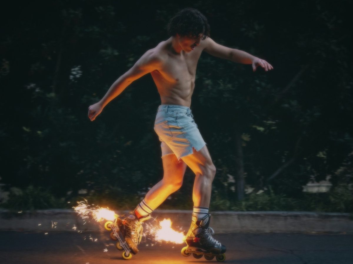 The album cover of Fireworks and Rollerblades, released on Friday, April 5, depicts singer-songwriter Benson Boone skating amid fireworks.