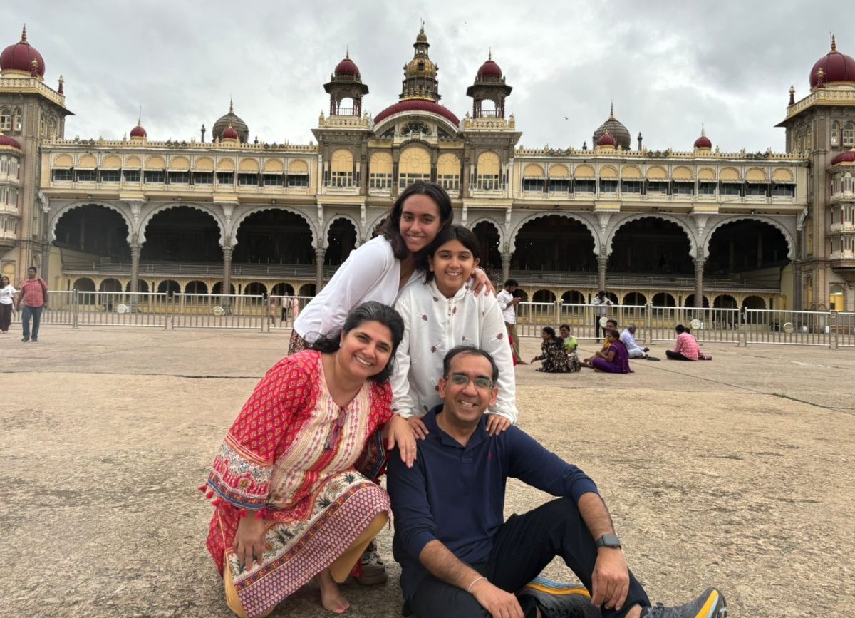 Accolade Opinion editor junior Aashna Dialani (top left) and her family pose in front of the Mysore Palace in Karnataka, India, on Friday, July 26.
