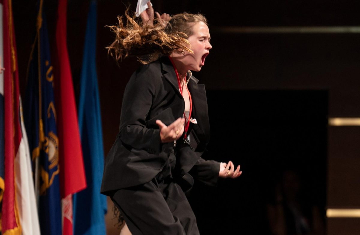 Cecelia Bartin celebrates onstage after receiving the majority of the votes to win the title of Governor in Apple TV+ documentary “Girls State.”