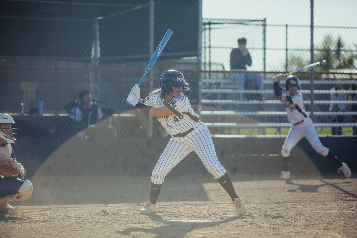 Second base sophomore Saraya Jhawar prepares to swing at an incoming pitch during the home game against Yorba Linda after school on Monday, March 3.