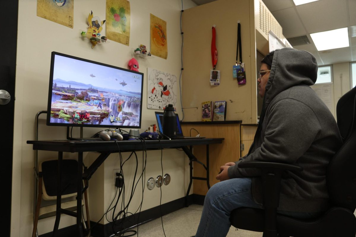 Super Smash Bros top newcomer junior Enrique Morales plays a match against Westchester Enriched Sciences Magnets High School on Thursday, April 3, after school in Room 111. Morales won 3-1.