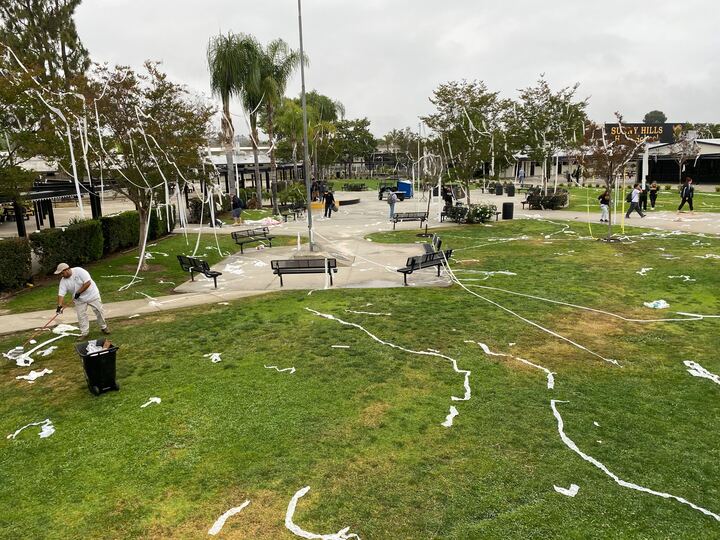 The Accolade captures the Class of 2024 senior prank for Photos of the Week with the caption, “Custodians work on clearing the campus of toilet paper left on trees and throughout parts of the quad before zero period on Friday, May 24.” The prank included inappropriate messages written in chalk on the pavement and classroom windows, rotten eggs thrown at lockers and vaseline spread on several classroom doors and locks. (Image taken by Aashna Dialani)