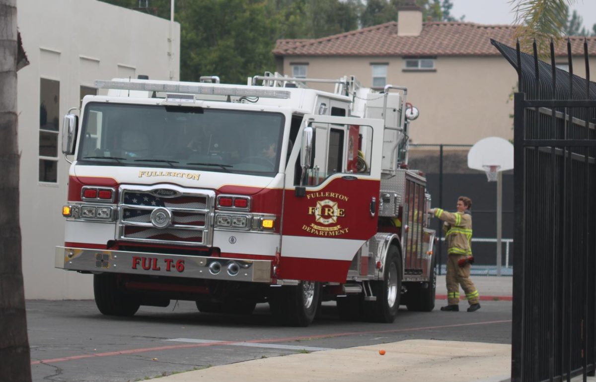 Fire Truck 6 from the Fullerton Fire Department arrives by the swimming pool to investigate the potential gas leak situation during fourth period on Friday, May 2.