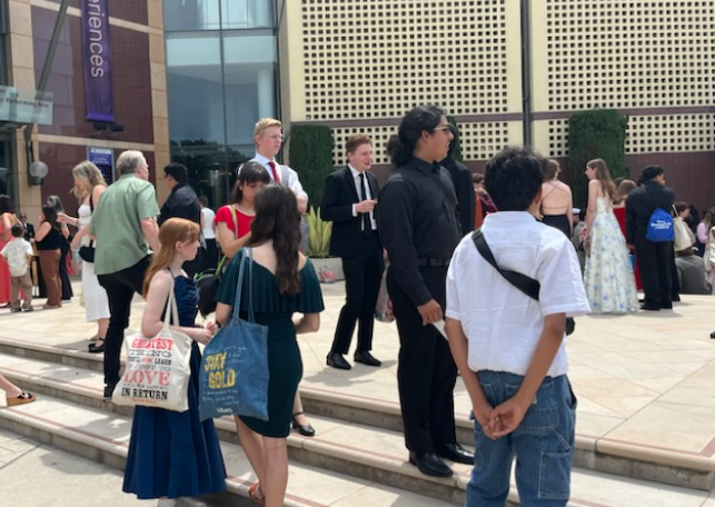 In their formal attire, the cast of “Joseph and the Amazing Technicolor Dreamcoat” stands on the steps outside the Cerritos Performing Arts Center waiting for the awards ceremony to begin on Sunday, June 1. 