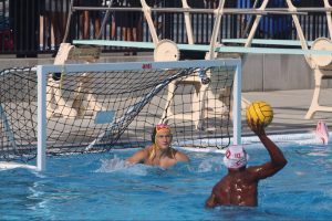 Goalie Thomas Oltman prepares to block a ball during a home game against Garden Grove High School on Thursday, Aug. 28, after school in the pool. The final score was 7-6, with the Lancers taking the victory. 