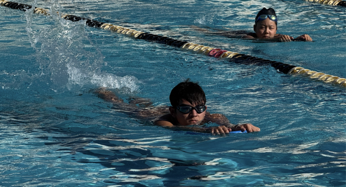 Sophomore Aiden Yoon practices for the Crestview League season with a kickboard in the SH swimming pool on Friday, Feb. 20. 