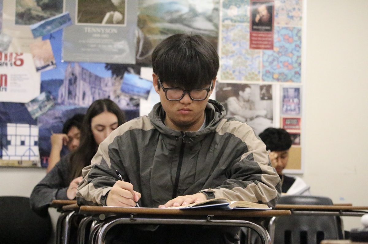 Senior Andrew Kim silently reads and annotates “The Pastures of Heaven” during fourth period California Literature class, a senior English elective, on Friday, April 10. 