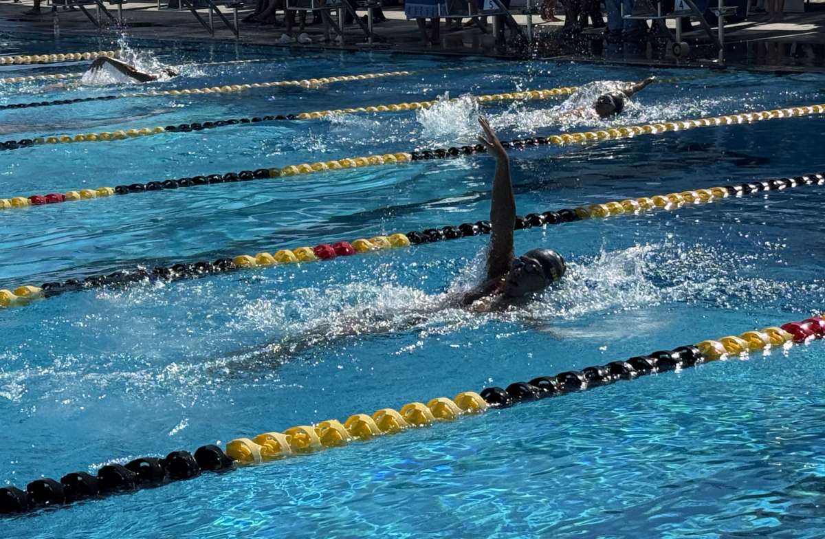 Sophomore William Ryoo competes in the boys 200-yard individual medley event on Wednesday, April 15, in the SH swimming pool. (Kyuwon Han)